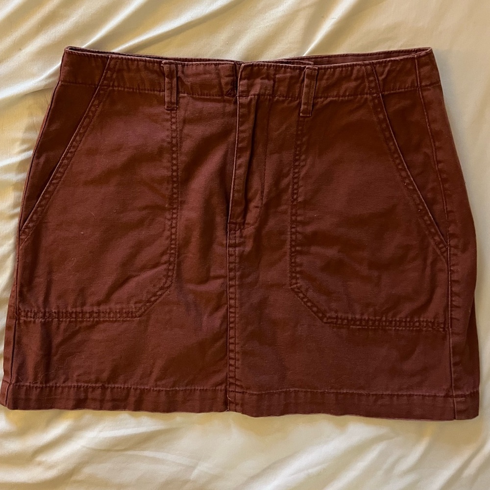 Burnt red mini cargo skirt with belt